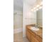 Bathroom featuring a shower-tub combination and granite countertops at 15818 N 25Th St # 124, Phoenix, AZ 85032