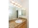 Bathroom vanity with mirror and granite countertops at 15818 N 25Th St # 124, Phoenix, AZ 85032