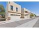 View of exterior of the home and garages at 15818 N 25Th St # 124, Phoenix, AZ 85032