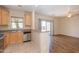 Functional kitchen with granite countertops, stainless steel appliances, and bar seating at 15818 N 25Th St # 124, Phoenix, AZ 85032