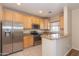 Well-equipped kitchen features stainless steel appliances and granite countertops at 15818 N 25Th St # 124, Phoenix, AZ 85032