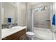 Bathroom featuring a vanity, tub, and shower combination at 16953 W Merrell St, Goodyear, AZ 85395