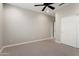 Spacious bedroom with neutral walls and two closets at 16953 W Merrell St, Goodyear, AZ 85395