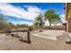 Expansive backyard featuring desert landscaping, gravel, and a concrete slab ready for customization at 17773 W Manso St, Goodyear, AZ 85338