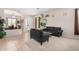 Inviting living room featuring neutral walls, plush seating, and tile flooring at 17773 W Manso St, Goodyear, AZ 85338