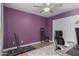 Functional bedroom with wood floors, ceiling fan, and a neutral color scheme at 18002 N 12Th St # 45, Phoenix, AZ 85022