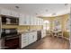 Well-equipped kitchen with modern appliances, ample cabinet space, and dining area at 18002 N 12Th St # 45, Phoenix, AZ 85022