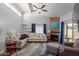 Cozy living room with vaulted ceiling, stone fireplace, and comfortable seating at 18002 N 12Th St # 45, Phoenix, AZ 85022