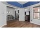 Open living space featuring hardwood floors, blue ceiling, and natural light at 18002 N 12Th St # 45, Phoenix, AZ 85022