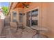 Enclosed patio with a ceiling fan, outdoor seating, and natural light at 18002 N 12Th St # 45, Phoenix, AZ 85022