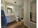 Bathroom with a shower-tub combo, and updated vanity, offering a relaxing and functional space at 1904 E Jarvis Ave, Mesa, AZ 85204