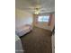 Bedroom with neutral colors and large window at 1904 E Jarvis Ave, Mesa, AZ 85204