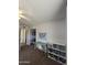 Bedroom with desk, carpet flooring, a closet, and a map on the wall at 1904 E Jarvis Ave, Mesa, AZ 85204