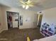 Bedroom with closet, shelves, and neutral tones at 1904 E Jarvis Ave, Mesa, AZ 85204