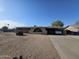 Single-story home with desert landscaping and an arched accent over the front window at 1904 E Jarvis Ave, Mesa, AZ 85204