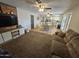 Bright and inviting living room with a media center and views of the open floor plan at 1904 E Jarvis Ave, Mesa, AZ 85204