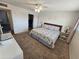 Inviting main bedroom with a king bed, soft lighting, and ample space at 1904 E Jarvis Ave, Mesa, AZ 85204