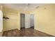Bedroom with hardwood floors, shelving, and large closet at 1917 E Lindrick Dr, Chandler, AZ 85249