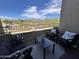 Relaxing balcony with comfortable seating and scenic mountain views at 19550 N Grayhawk Dr # 2023, Scottsdale, AZ 85255