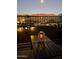 Peaceful balcony illuminated by string lights under the night sky, serene mountain backdrop at 19550 N Grayhawk Dr # 2023, Scottsdale, AZ 85255