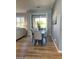 Bright dining room with plantation shutters and views to the outside at 19550 N Grayhawk Dr # 2023, Scottsdale, AZ 85255