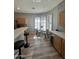 Bright kitchen with a breakfast nook and window shutters for privacy at 19550 N Grayhawk Dr # 2023, Scottsdale, AZ 85255