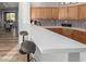 This lovely kitchen has a breakfast bar with counter seating, as well as stainless appliances at 19550 N Grayhawk Dr # 2023, Scottsdale, AZ 85255