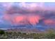 Dramatic landscape view with colorful clouds over the mountains at 19550 N Grayhawk Dr # 2023, Scottsdale, AZ 85255