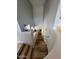 Stairway illuminated by in-step lighting, leading to the lower level of the home at 19550 N Grayhawk Dr # 2023, Scottsdale, AZ 85255