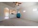 Open-concept living room flows into the kitchen, creating a welcoming and spacious atmosphere at 1956 N Hubbard Ln, Casa Grande, AZ 85122