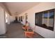 Spacious covered patio with comfortable seating, offering a perfect spot for outdoor entertaining at 19880 W Desert Views Dr, Casa Grande, AZ 85122