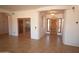 Inviting foyer features tile flooring, archways and custom wood front door at 19880 W Desert Views Dr, Casa Grande, AZ 85122