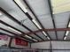 Inside steel garage showcasing ample open space, concrete floor, and steel beam framing and walls at 19880 W Desert Views Dr, Casa Grande, AZ 85122