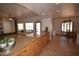 Open kitchen features a granite countertop, natural light, and seamless access to living areas at 19880 W Desert Views Dr, Casa Grande, AZ 85122