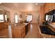 Spacious kitchen features stainless steel appliances, tile floors, and granite countertops at 19880 W Desert Views Dr, Casa Grande, AZ 85122