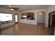 Open concept living room and kitchen area; large windows for natural light at 19880 W Desert Views Dr, Casa Grande, AZ 85122
