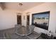 Charming patio with neutral tones, perfect for outdoor relaxation and entertaining with table and chairs at 19880 W Desert Views Dr, Casa Grande, AZ 85122