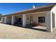 Covered patio with outdoor seating, perfect for relaxing and enjoying the desert views at 19880 W Desert Views Dr, Casa Grande, AZ 85122