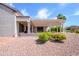 The backyard has a covered patio, perfect for entertaining guests at 20039 N Hearthstone Dr, Surprise, AZ 85374