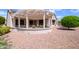 This house has a covered patio in the large and well maintained backyard at 20039 N Hearthstone Dr, Surprise, AZ 85374