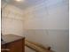 Walk-in closet with adjustable wire shelving for optimal storage in this home's primary bedroom at 20039 N Hearthstone Dr, Surprise, AZ 85374
