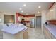 Spacious kitchen with stainless appliances, extended countertop, and ample cabinet space at 20039 N Hearthstone Dr, Surprise, AZ 85374
