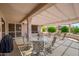 The covered patio is the perfect place to sit and enjoy the beautiful landscape of the community at 20039 N Hearthstone Dr, Surprise, AZ 85374