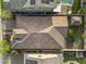An aerial shot highlights the home's roof, backyard, and proximity to neighboring houses at 20458 W Briarwood Dr, Buckeye, AZ 85396