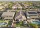 The aerial perspective showcases the home, backyard, community, and its location in the neighborhood at 20458 W Briarwood Dr, Buckeye, AZ 85396