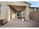 Cozy covered patio with comfortable seating, perfect for relaxing outdoors at 20458 W Briarwood Dr, Buckeye, AZ 85396