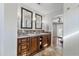 Bathroom vanity with dual sinks, granite countertop, and modern fixtures at 2119 E Daley Ln, Phoenix, AZ 85024