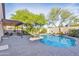 Backyard pool featuring a patio with lounge chairs at 2119 E Daley Ln, Phoenix, AZ 85024