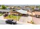 Charming home with well-maintained lawn, mature tree, and paved driveway in a desirable neighborhood setting at 2132 W Chambers St, Phoenix, AZ 85041