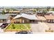 Inviting home featuring a manicured front yard, covered parking, and a welcoming entrance, perfect for a Gathering at 2132 W Chambers St, Phoenix, AZ 85041